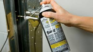 Can of Blaster Garage Door Lubricant for Residential Garage Door Maintenance Tips.