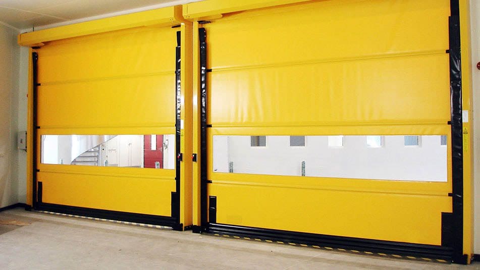 Yellow Commercial High Speed Doors after completion by Architectural Specialties.