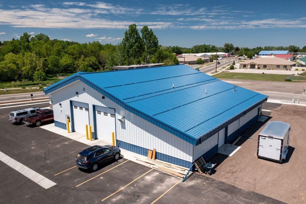 White commercial Garage Door after completion with Architectural Specialties in Rapid City, SD.