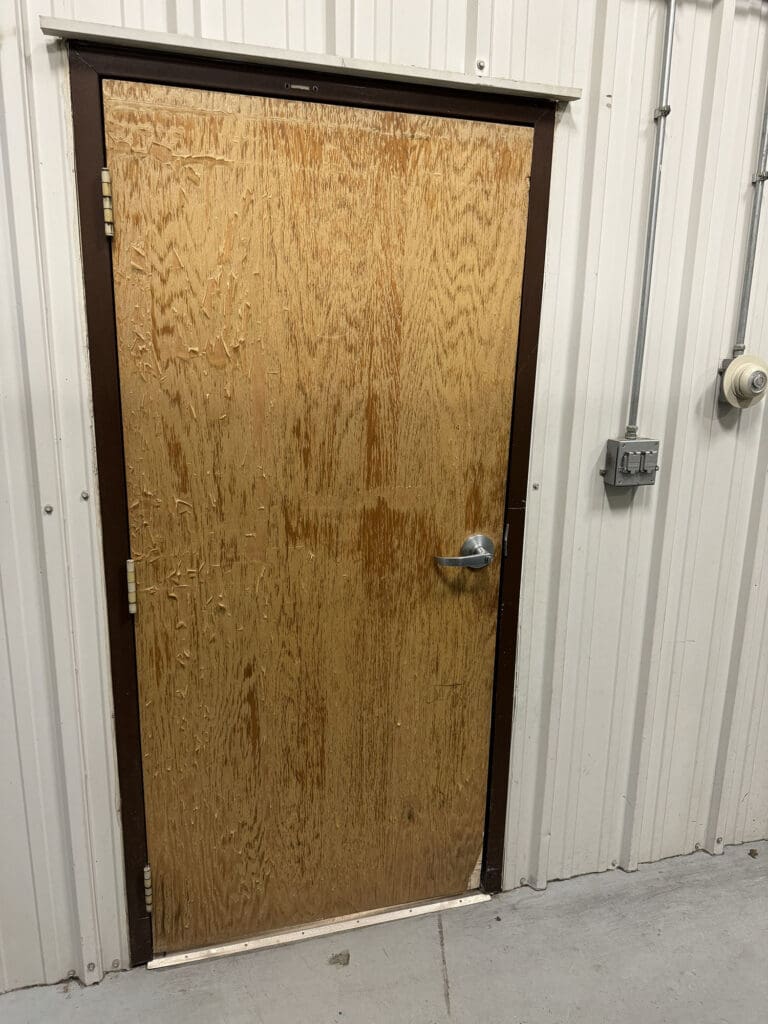 Before of old wooden commercial door