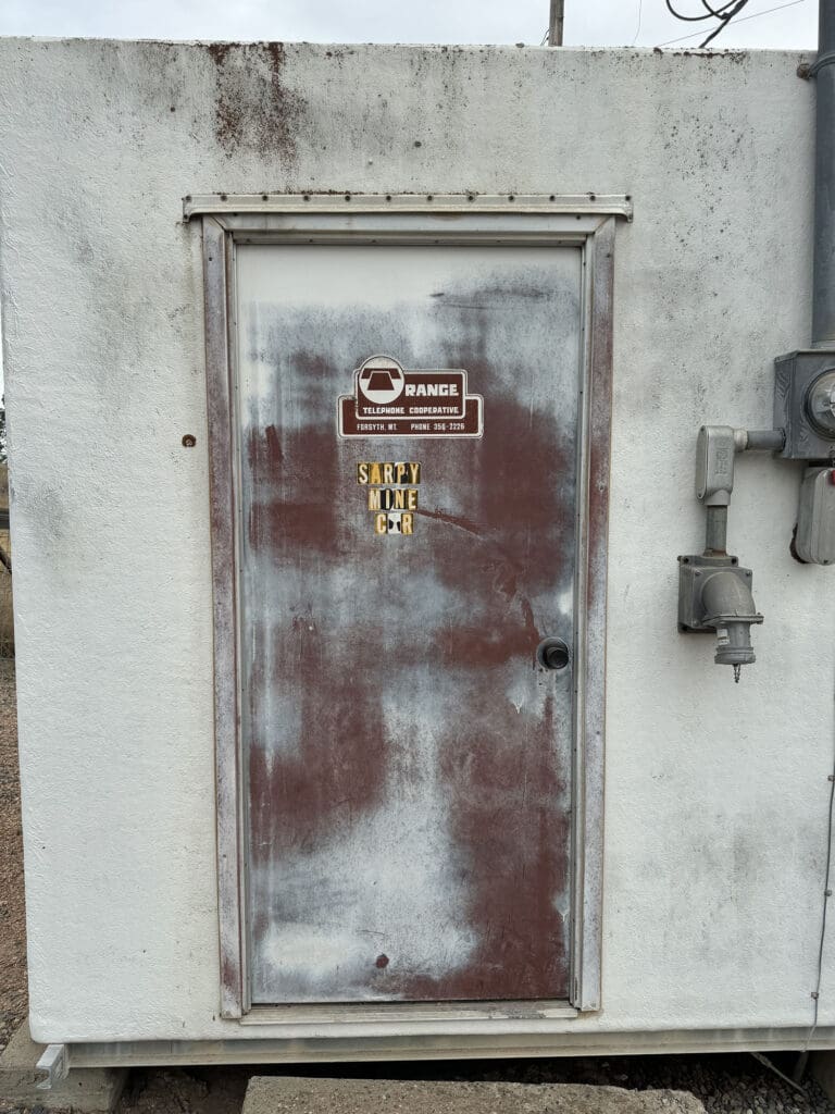 Before of old commercial door with faded paint