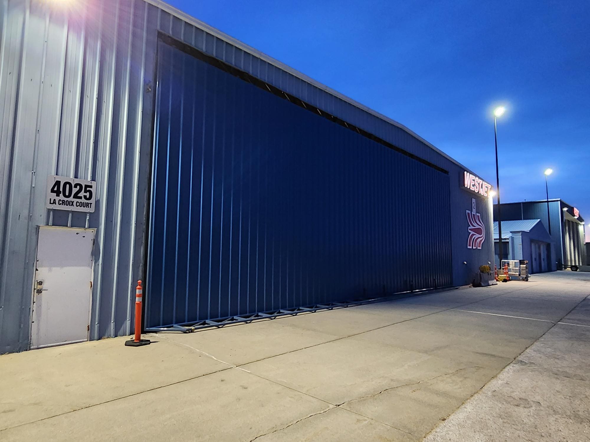 finished powerlift hydraulic door on airplane hangar