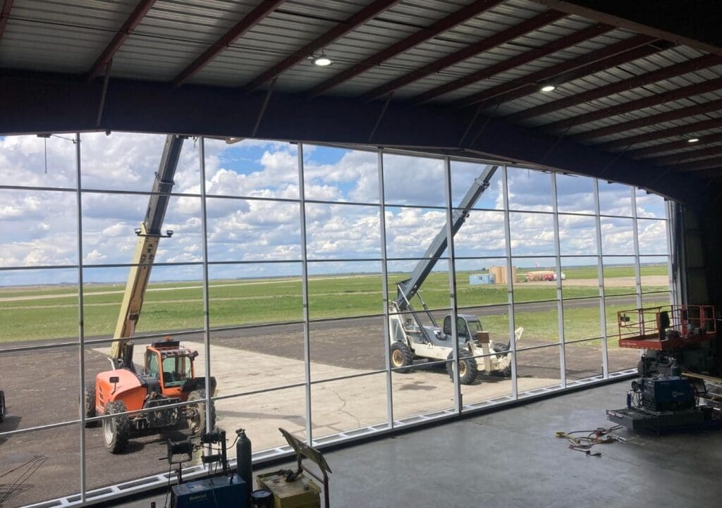 Installation Process of Powerlift Hydraulic Door at Miles City Hangar