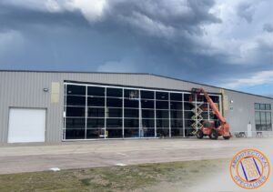 Image of Commercial Door being installed by Architectural Specialties.