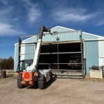 image of barn with new hydraulic PowerLift door