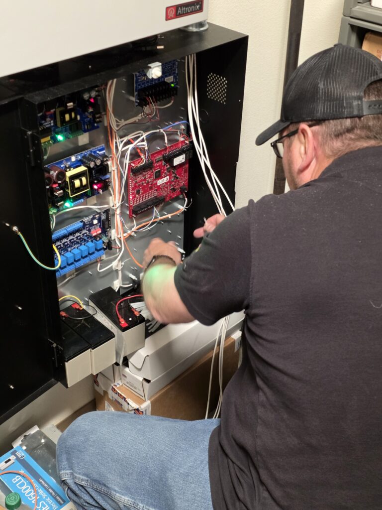 Architectural Specialties crew wiring security system