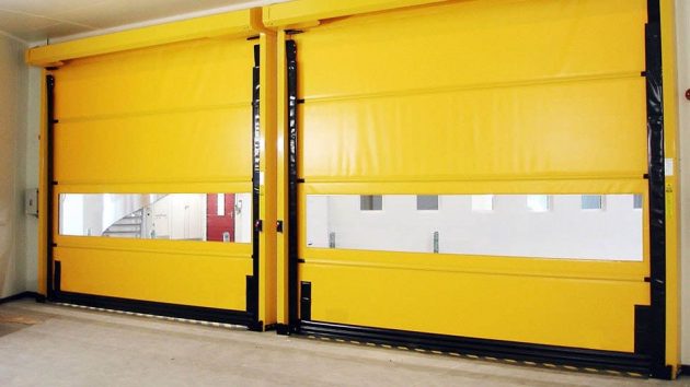 Yellow Commercial High Speed Doors after completion by Architectural Specialties. Yellow Commercial High Speed Doors after completion by Architectural Specialties.