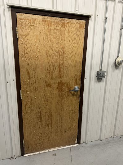 Before of old wooden commercial door
