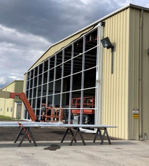 Miles City Smoke Jumpers Hangar with newly installed Powerlift Hydraulic Door Miles City Smoke Jumpers Hangar with newly installed Powerlift Hydraulic Door